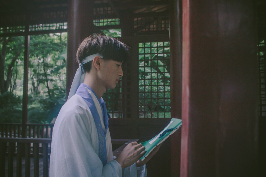 Journalist reviewing documents and data at a desk