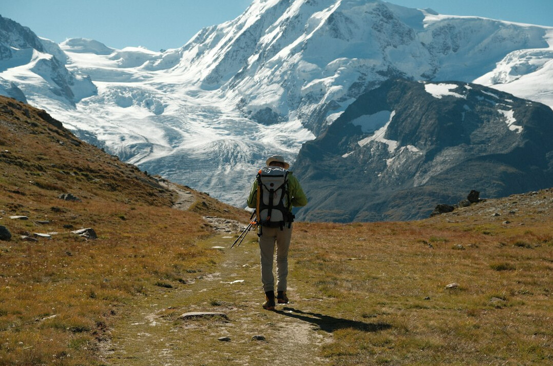 investigator hiking in alps